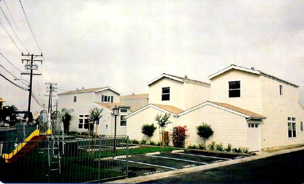 Palm Vista after PMD — 15 two-story townhomes with garages, playground, 2005.
